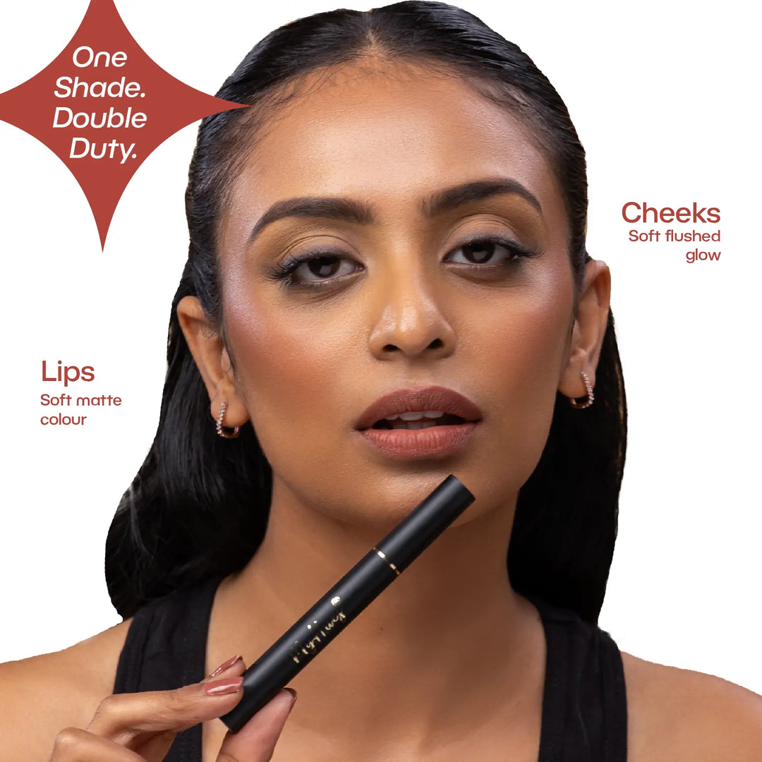 Indian model wearing MyHues Smudgestix Burfee as both lipstick and blush, demonstrating the versatile warm nude brown lip and cheek stick. Creamy soft matte formula blends seamlessly on cheeks while delivering comfortable, long-lasting colour on lips.