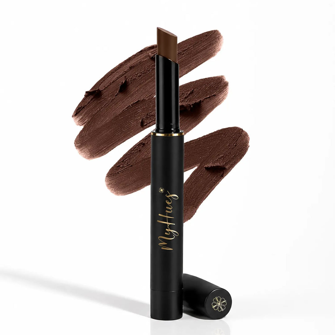 MyHues Smudgestix Jalebi deep warm brown bullet lipstick displayed with creamy lipstick swatches in the background. Premium black and gold packaging showcasing a soft matte lip and cheek stick with rich pigmentation, smooth blendability, and comfortable all-day wear for Indian skin tones.