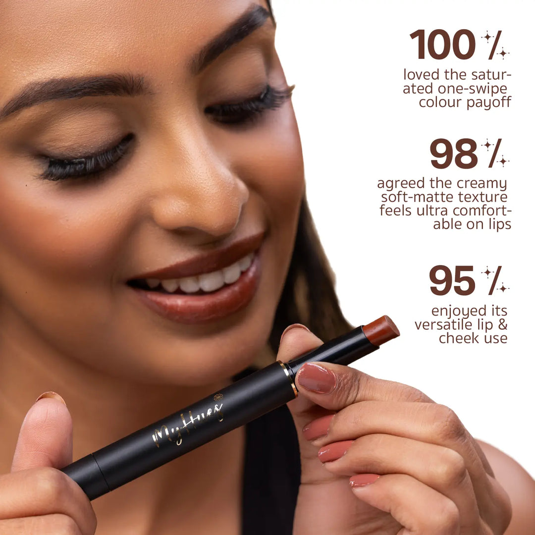 Dusky skin tone indian model wearing MyHues Smudgestix Jalebi, a deep warm brown soft matte lip and cheek stick. Consumer-tested results show 100% loved the one-swipe colour payoff, 98% praised the creamy comfortable texture, and 95% enjoyed its versatile application on lips and cheeks.