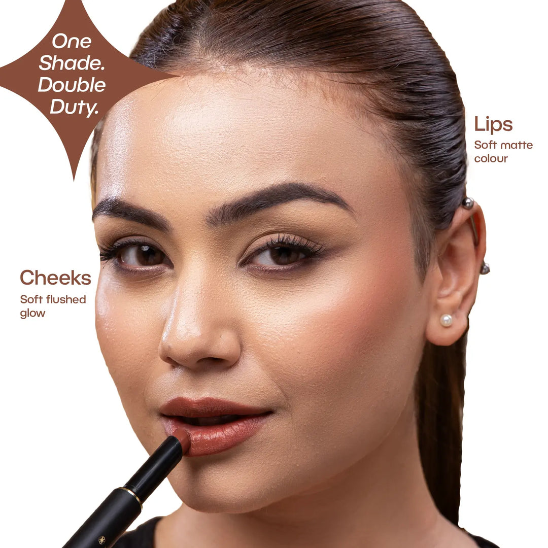 Indian model wearing MyHues Smudgestix Mishti as both lipstick and blush, demonstrating the versatile cool nude brown lip and cheek stick. Creamy soft matte formula blends effortlessly on cheeks while providing comfortable, long-lasting colour on lips.