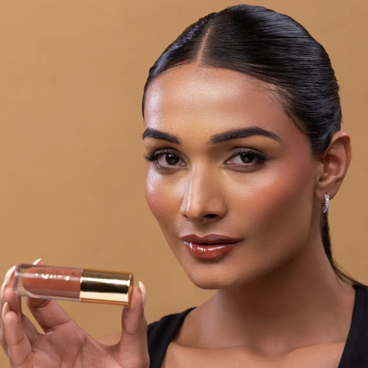MyHues HyGlow Lip Elixir in Heer – nude brown lip gloss on medium Indian skin tone, high shine hydrating lip gloss with rich pigmentation and non sticky glossy finish