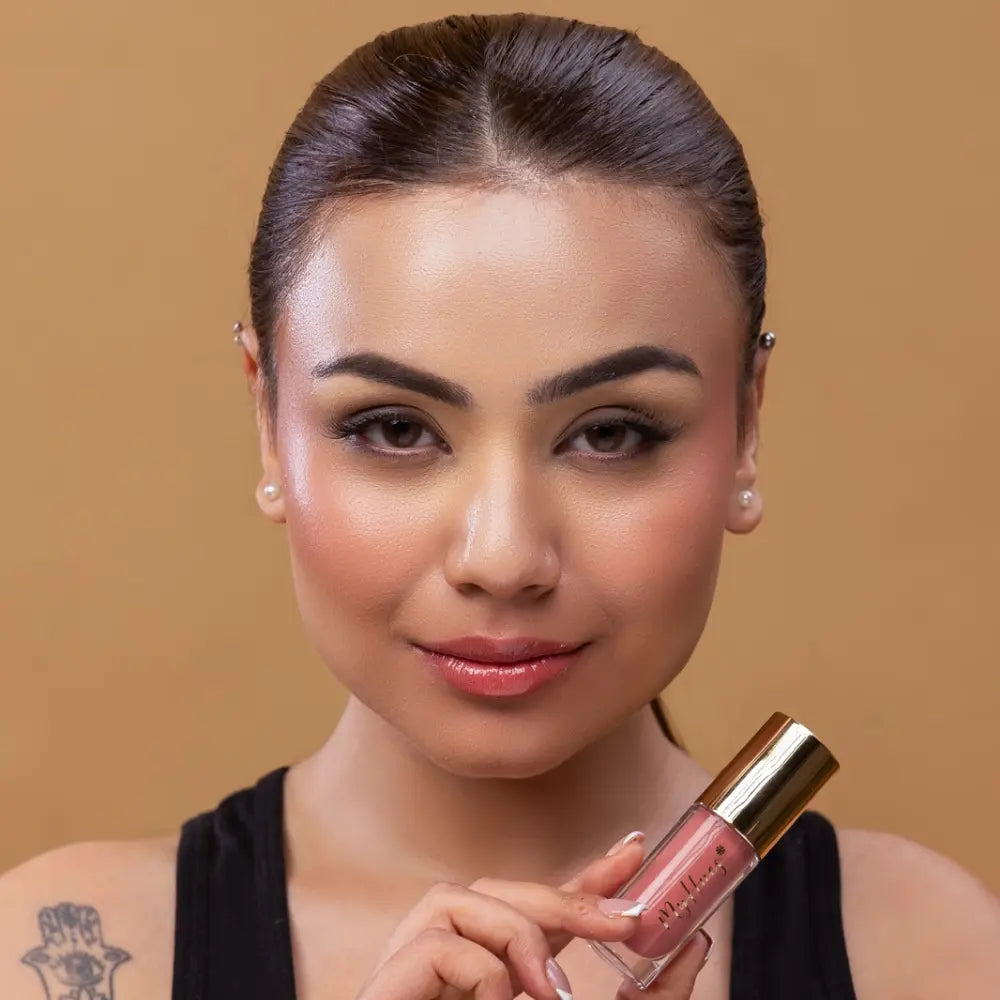 MyHues HyGlow Lip Elixir in Tara – light pink lip gloss on fair Indian skin tone, high shine hydrating lip gloss with smooth glossy finish and even pigmentation

