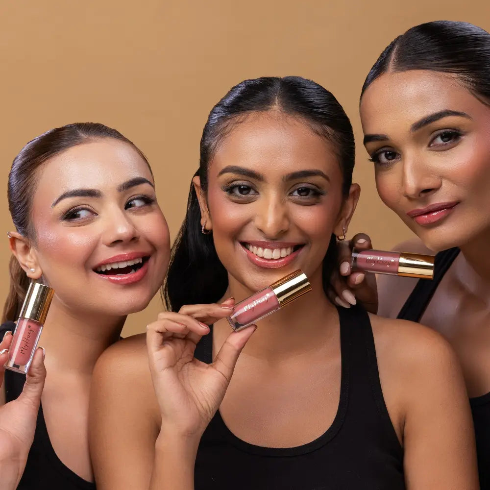 MyHues HyGlow Lip Elixir in Tara – light pink lip gloss shown on fair, medium and deep Indian skin tones, high shine hydrating lip gloss with rich pigmentation and smooth non sticky glossy finish