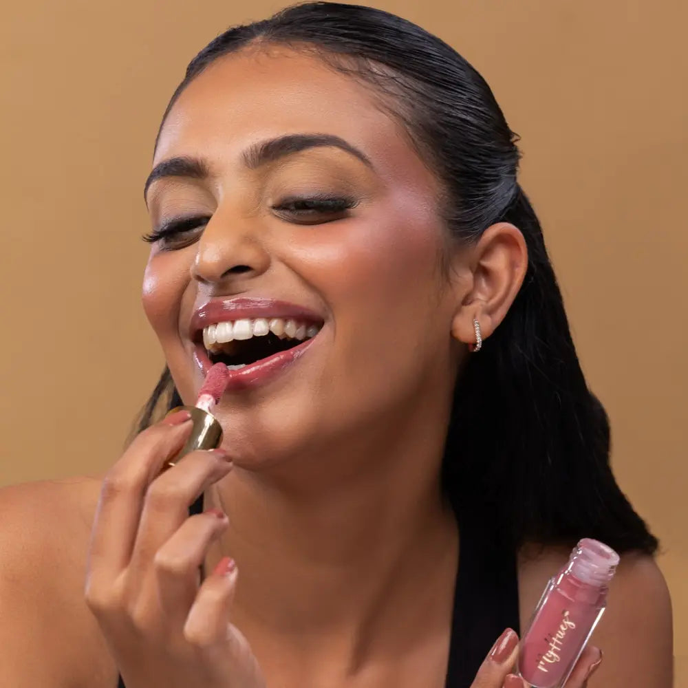 MyHues HyGlow Lip Elixir in Rooh – nude pink lip gloss on medium Indian skin tone, high shine hydrating lip gloss with rich pigmentation and non sticky glossy finish