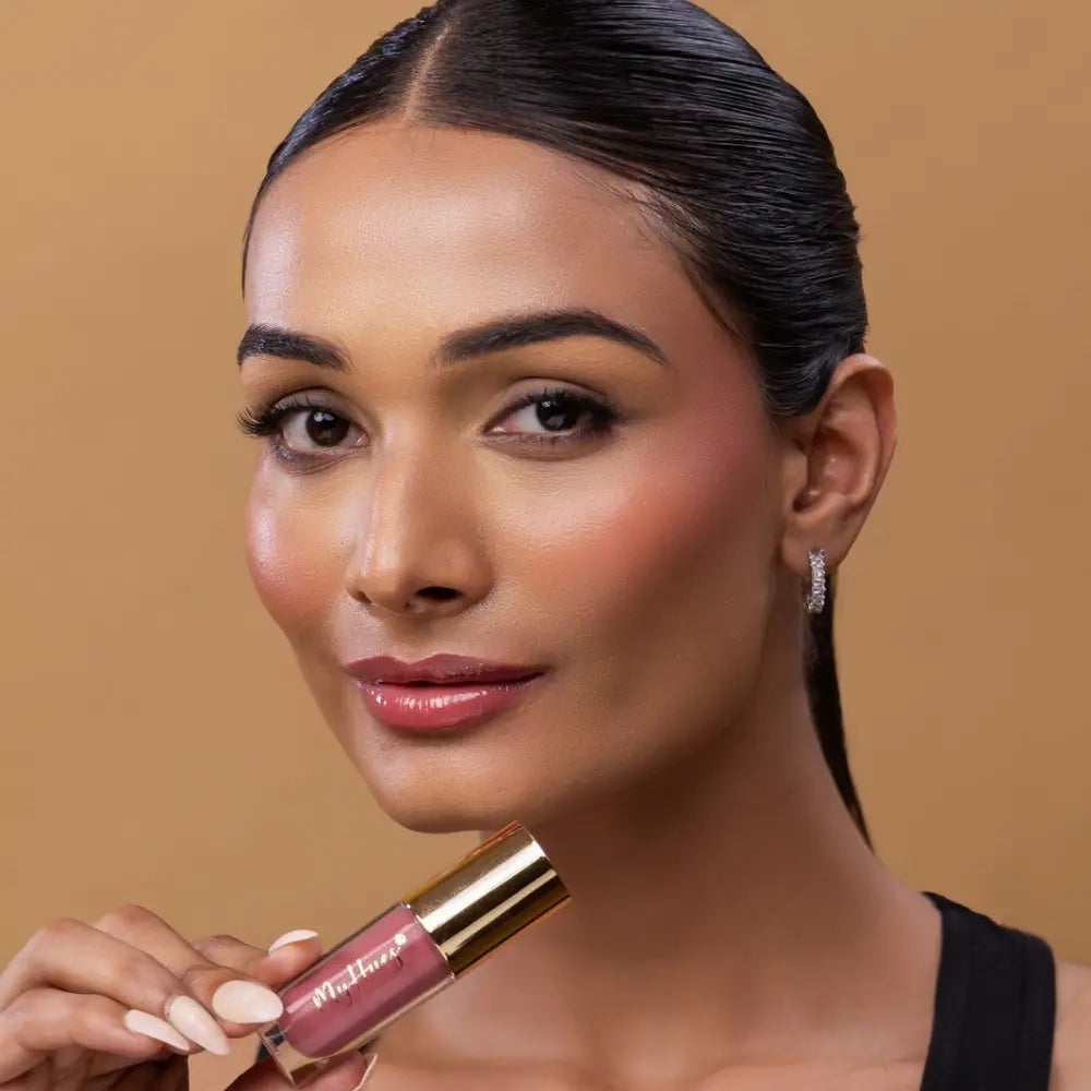 MyHues HyGlow Lip Elixir in Rooh – nude pink lip gloss on medium Indian skin tone, high shine hydrating lip gloss with rich pigmentation and non sticky glossy finish