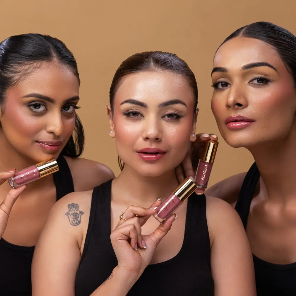 MyHues HyGlow Lip Elixir in Rooh – nude pink lip gloss shown on fair, medium and deep Indian skin tones, high shine hydrating lip gloss with rich pigmentation and smooth non sticky glossy finish

