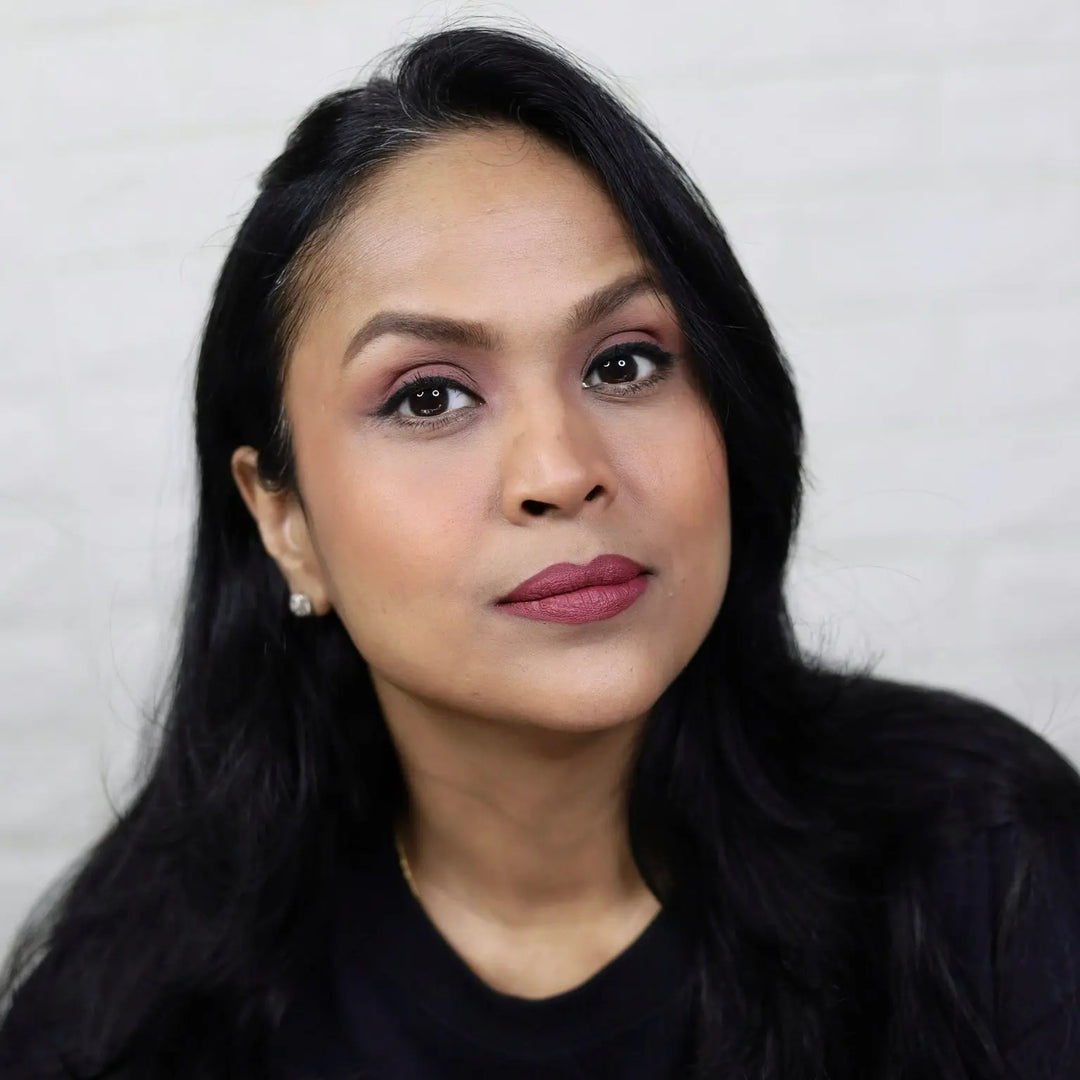 MyHues Gulkand berry pink liquid lipstick on Shalini Srivastava medium brown Indian skin tone, muted rosy pink shade with high pigmentation and comfortable non drying matte finish on lips
