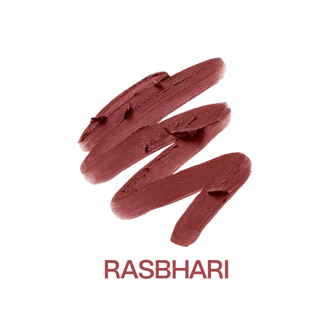 Macro close-up of MyHues Smudgestix Rasbhari dusty nude pink lipstick gliding across rich creamy pigment. Soft matte bullet lipstick with one-swipe colour payoff, buildable coverage, smooth application, and a blendable lip and cheek formula for effortless everyday makeup.