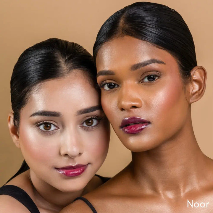 MyHues HyGlow Lip Elixir in Noor – burgundy lip gloss shown on fair and deep Indian skin tones, high shine hydrating lip gloss with rich pigmentation and non sticky glossy finish