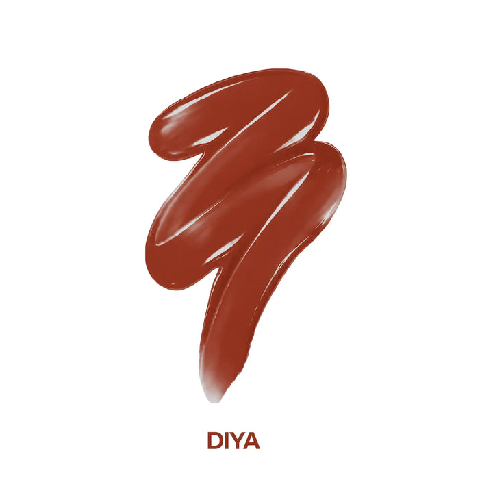 MyHues HyGlow Lip Elixir Diya shade swatch featuring a glossy warm terracotta brown lip oil and lip gloss hybrid. Highly pigmented formula delivers high-shine colour, smooth application, lightweight hydration and comfortable wear while helping cover dark or pigmented lips.