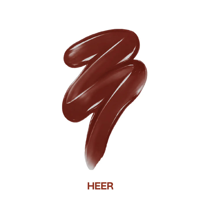 MyHues HyGlow Lip Elixir Heer shade swatch featuring a glossy nude brown lip oil and lip gloss hybrid. Highly pigmented formula delivers high-shine colour, smooth application, lightweight hydration and comfortable wear while helping cover dark or pigmented lips.