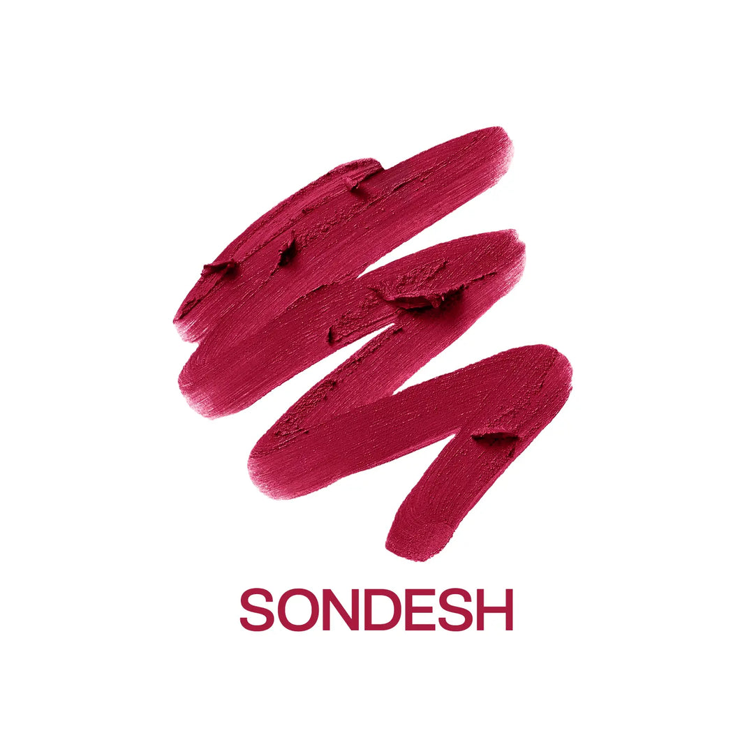 Extreme close-up of MyHues Smudgestix Sondesh creamy burgundy lipstick gliding over rich pigment. Soft matte bullet lipstick featuring one-swipe pigmentation, fuss-free application, buildable colour, and a smooth blendable formula for lips and cheeks.