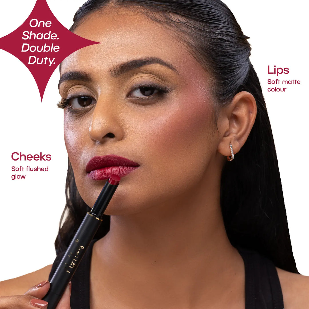 Indian model wearing MyHues Smudgestix Sondesh as both lipstick and blush, demonstrating the dual-use lip and cheek stick. Deep burgundy soft matte finish delivers comfortable colour on lips and a naturally blended flush on cheeks for Indian skin tones.