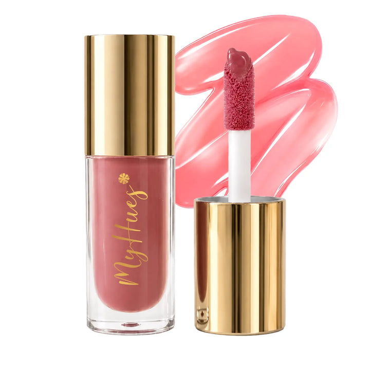 MyHues HyGlow Lip Elixir Tara light nude pink lip oil and lip gloss featuring premium gold packaging, plush doe-foot applicator and glossy nude pink swatch. Highly pigmented lip gloss with nourishing oils delivers mirror-like shine, lightweight comfort and flattering colour for Indian skin tones.
