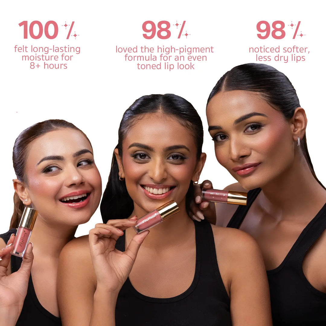 Indian model applying MyHues HyGlow Lip Elixir Tara, a light nude pink high-shine lip oil and lip gloss. Consumer-tested results show 100% experienced long-lasting moisture for over 8 hours, 98% noticed softer lips, and 98% loved the richly pigmented formula for an even-toned lip look.